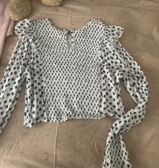 Blusa Noon manga larga estampada