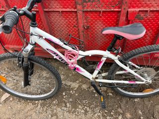 Bicicleta Orbea Blanca y Rosa