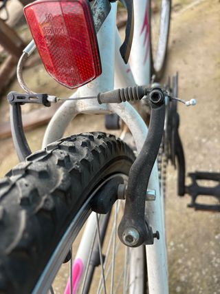 Bicicleta Orbea Blanca y Rosa