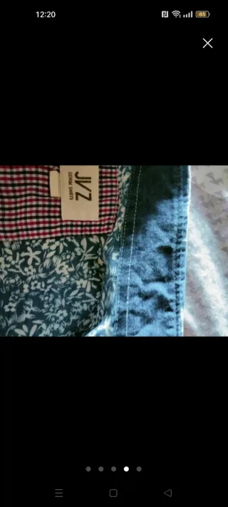 Camisa de cuadros azul y blanca Talla S. El corte