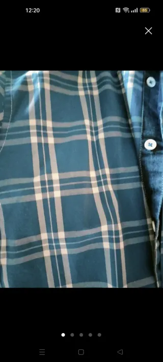 Camisa de cuadros azul y blanca Talla S. El corte