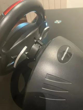 PS3 con volante, 2 mandos y 3 juegos