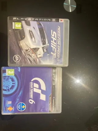 PS3 con volante, 2 mandos y 3 juegos