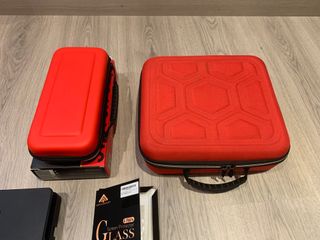 Nintendo Switch OLED, mandos, SD + accesorios.