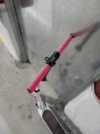 Patinete Oxelo rosa y blanco