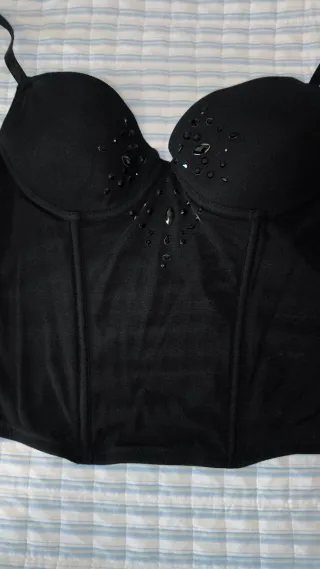 Corsetto nero con dettagli