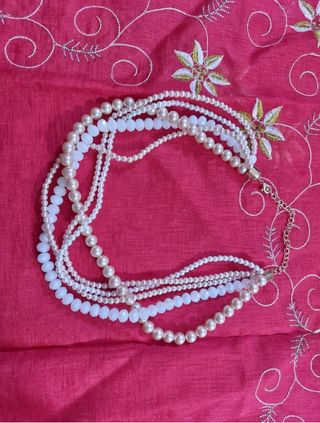 Collana perle Cristian Lay beige e bianche