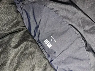 Abrigo Largo Plumas Uniqlo Negro.Vale 199 euros