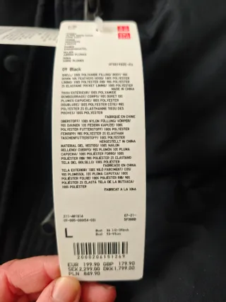 Abrigo Largo Plumas Uniqlo Negro.Vale 199 euros