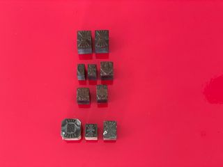 Conjunto sellos plomo y madera imprenta