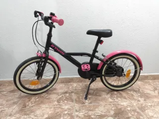 Bicicleta infantil Btwin rosa y negra