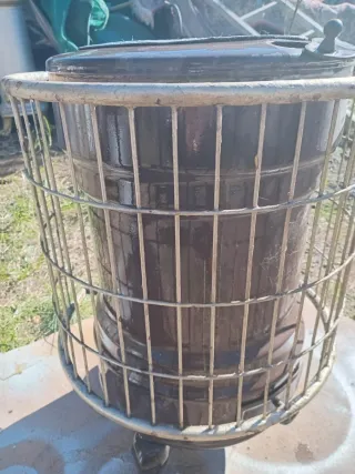 Estufa de leña cerámica y metal