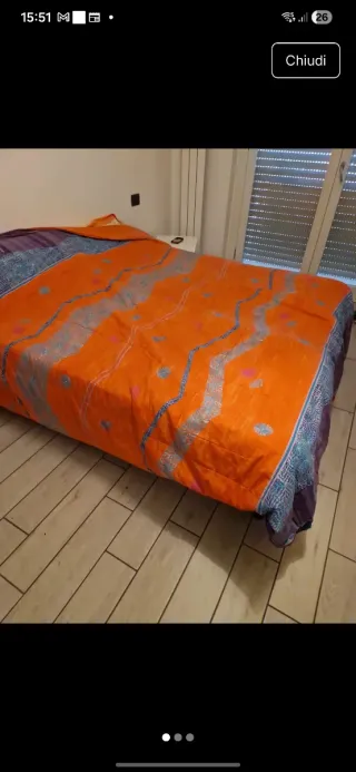 Trapunta arancione con decorazioni