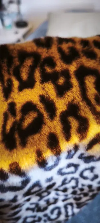 Cuello abrigo animal print Mango