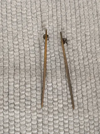 Brincos longos dourados