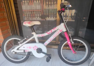 Bicicleta infantil rosa y blanca
