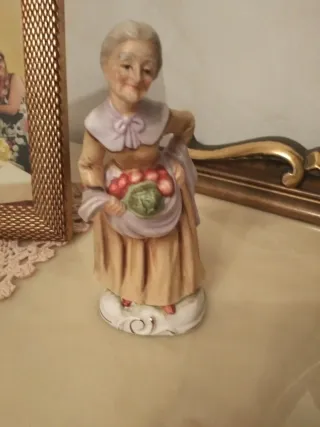 Statuette vintage tre anziani