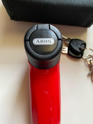 Candado de disco ABUS rojo con funda y llaves