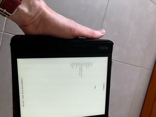 Cover Kobo Forma con design a libro