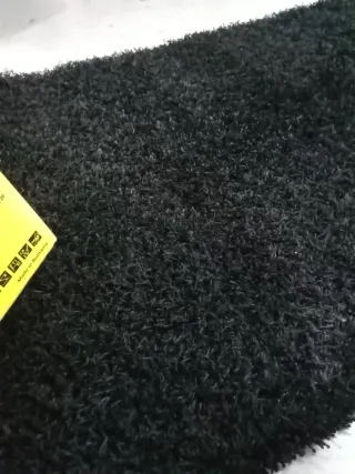 Alfombra negra pelo largo