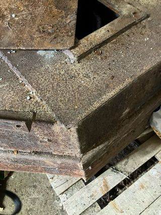 Chimenea de rincón de hierro fundido