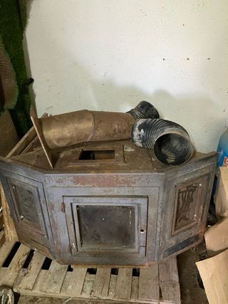 Chimenea de rincón de hierro fundido