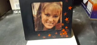 Cornice portafoto nera con stelle rosse