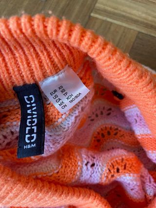 Maglione crop vintage vibes arancione e bianco
