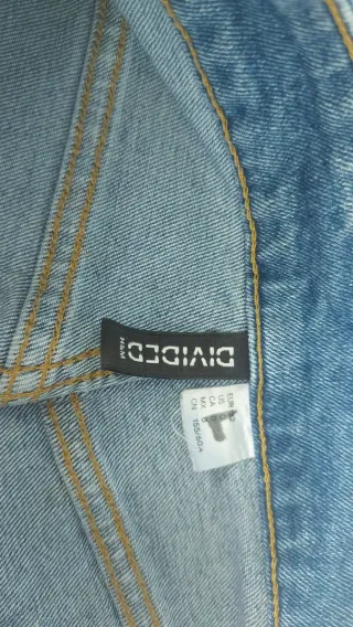 Vaqueros cortos desgastados. Talla 32.