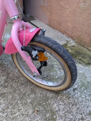 Bici infantil rosa con ruedines