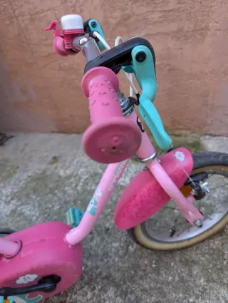 Bici infantil rosa con ruedines