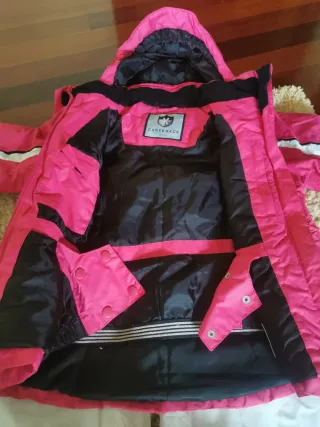 Traje de esquí infantil rosa y blanco