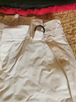 Traje de esquí infantil rosa y blanco