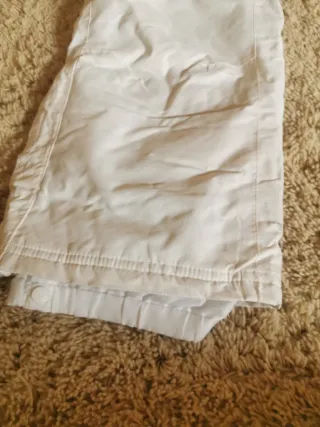 Traje de esquí infantil rosa y blanco