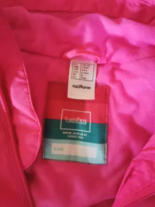 Mono de esquí rosa y blanco