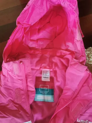 Mono de esquí rosa y blanco