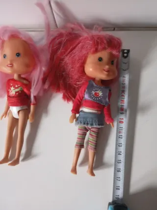 2 Muñecas pelo rosa