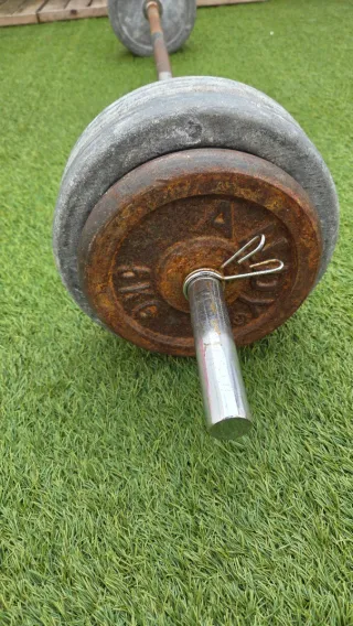 Barra y discos pesas