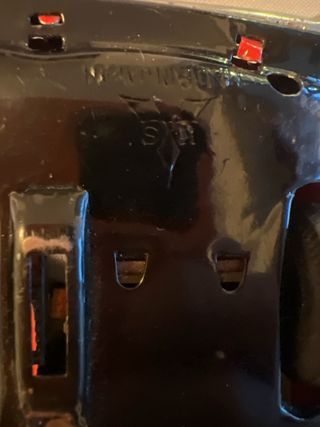 Auto giocattolo in latta vintage rosso