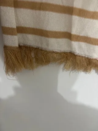 Stola oro e bianca con frange