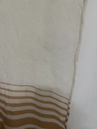 Stola oro e bianca con frange