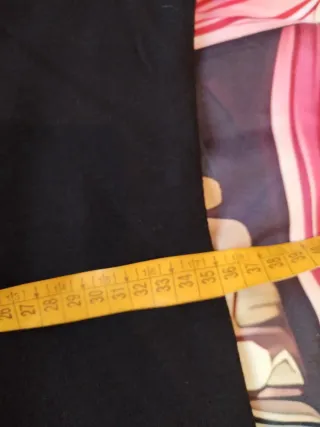 Abito neroin misto lana con volant