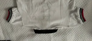 Polo bimbo bianco con stampa