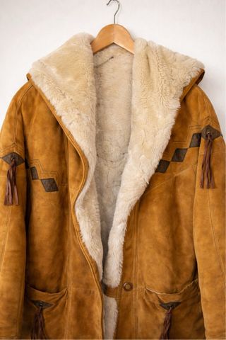 Cappotto shearling con cappuccio
