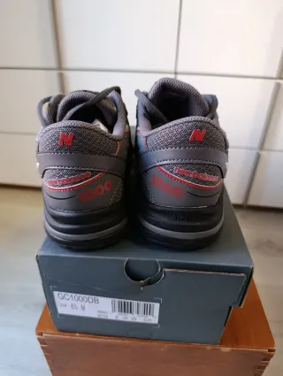 New Balance 1000 unisex gris/rojo talla 39