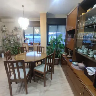 Comedor de madera y cristal