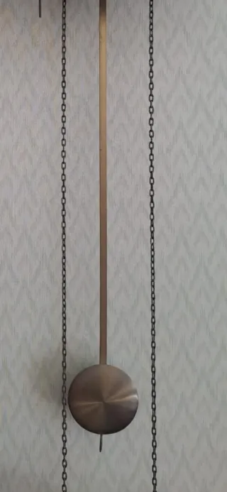 Pendolo per orologio a muro