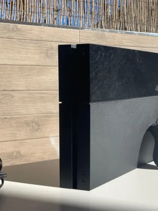 COMO NUEVA Ps4 fat con mando