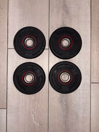 Manubri palestra con relativi pesi e blocca dischi