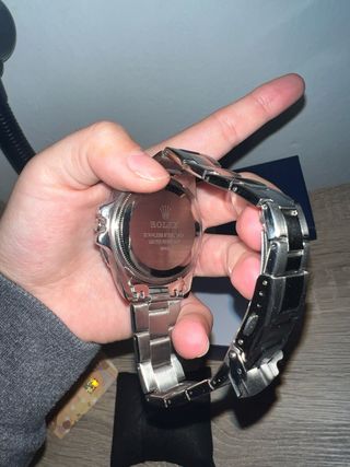 Vendo reloj hombre color plata y azul